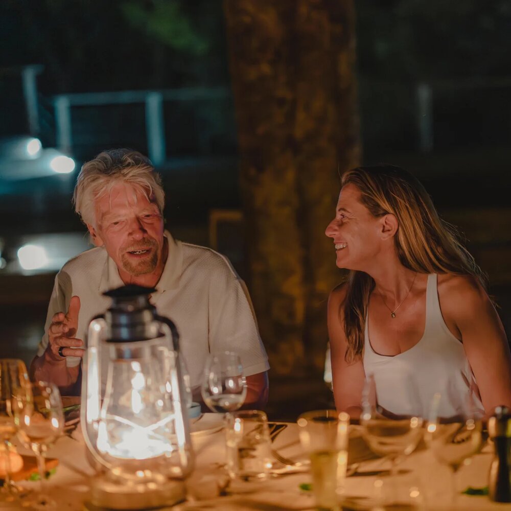 Ilana Golan with Richard Branson at a dinner on Necker Island