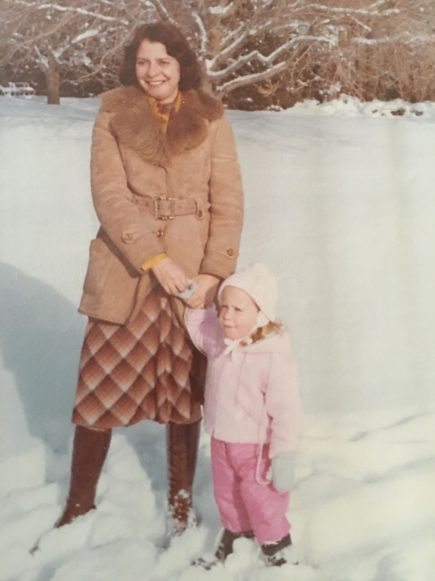 Ilana as a young child with her mother in the snow