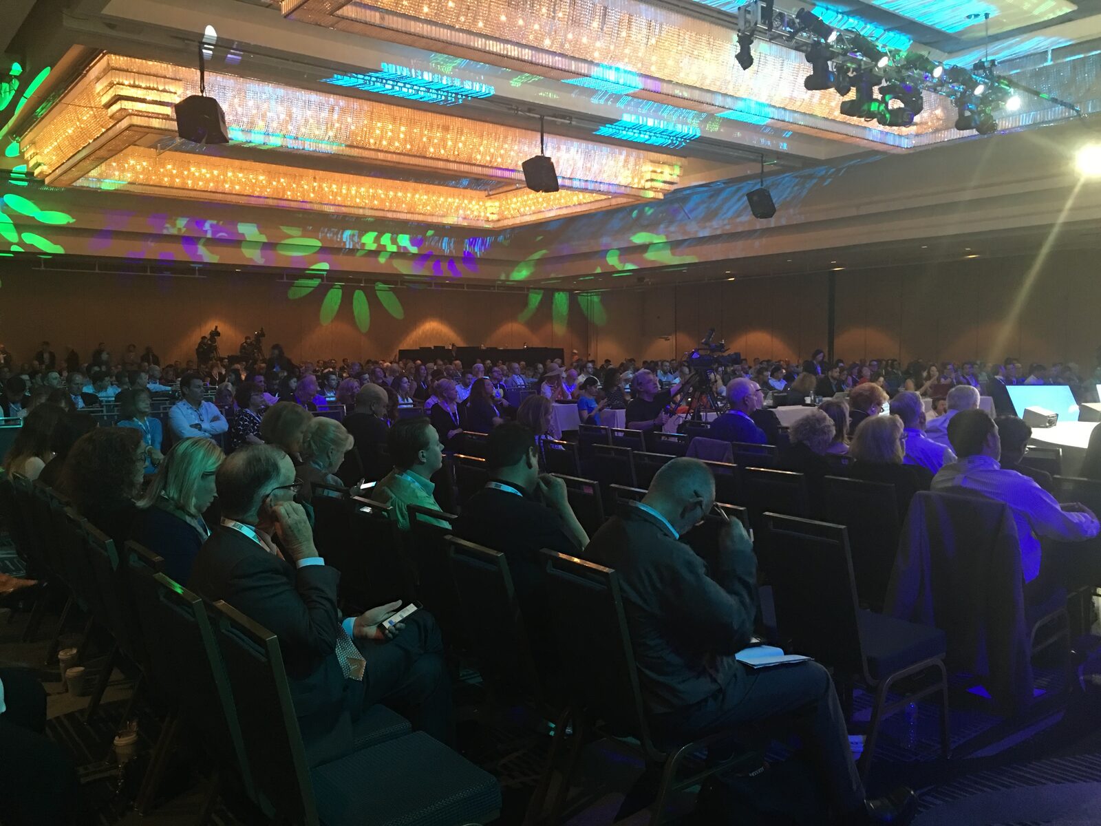 A packed ballroom audience at a conference where Ilana Golan spoke